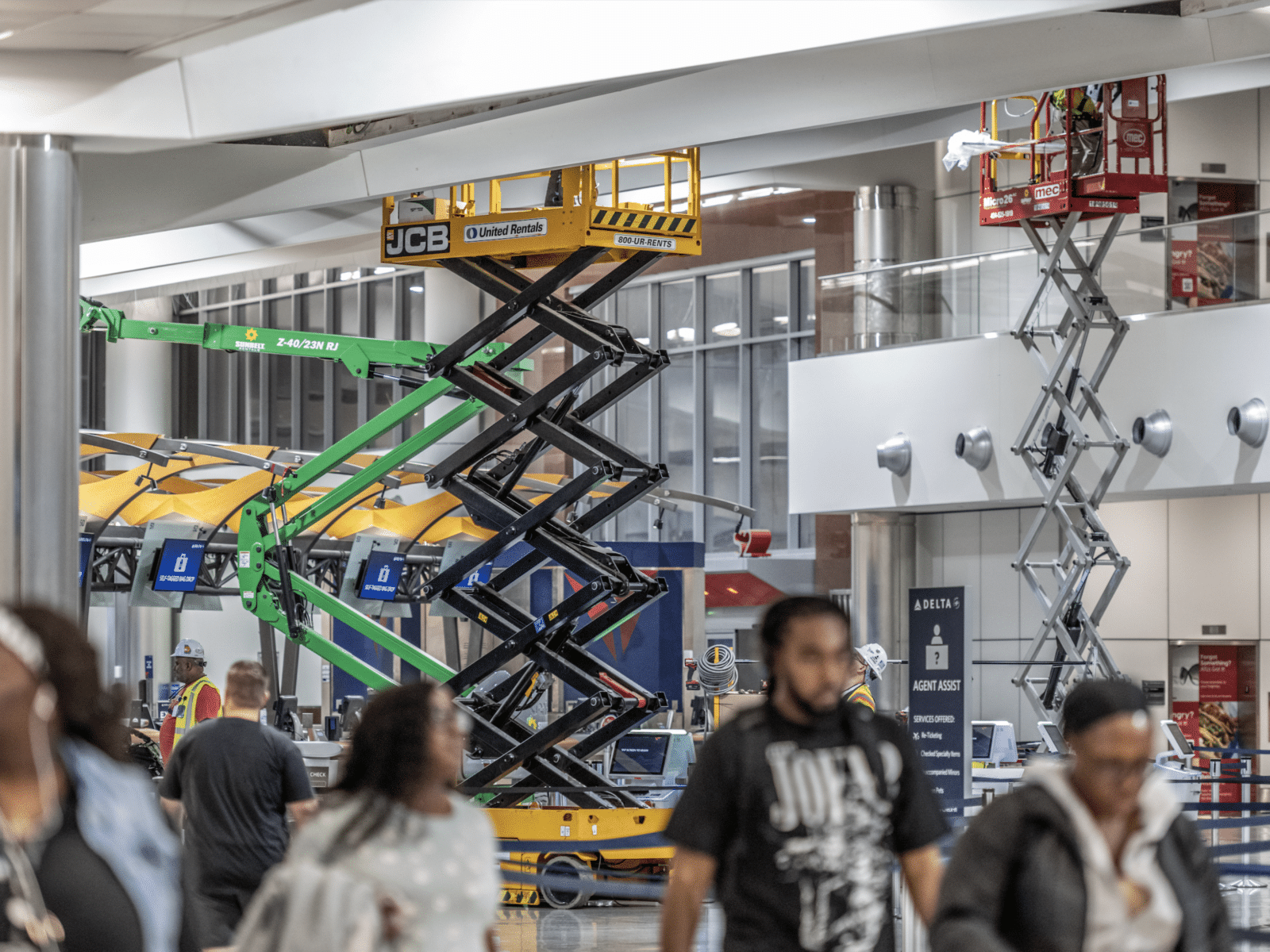 interior image of scissor lifts in a construction zone at hartsfield-jackson atlanta international airport