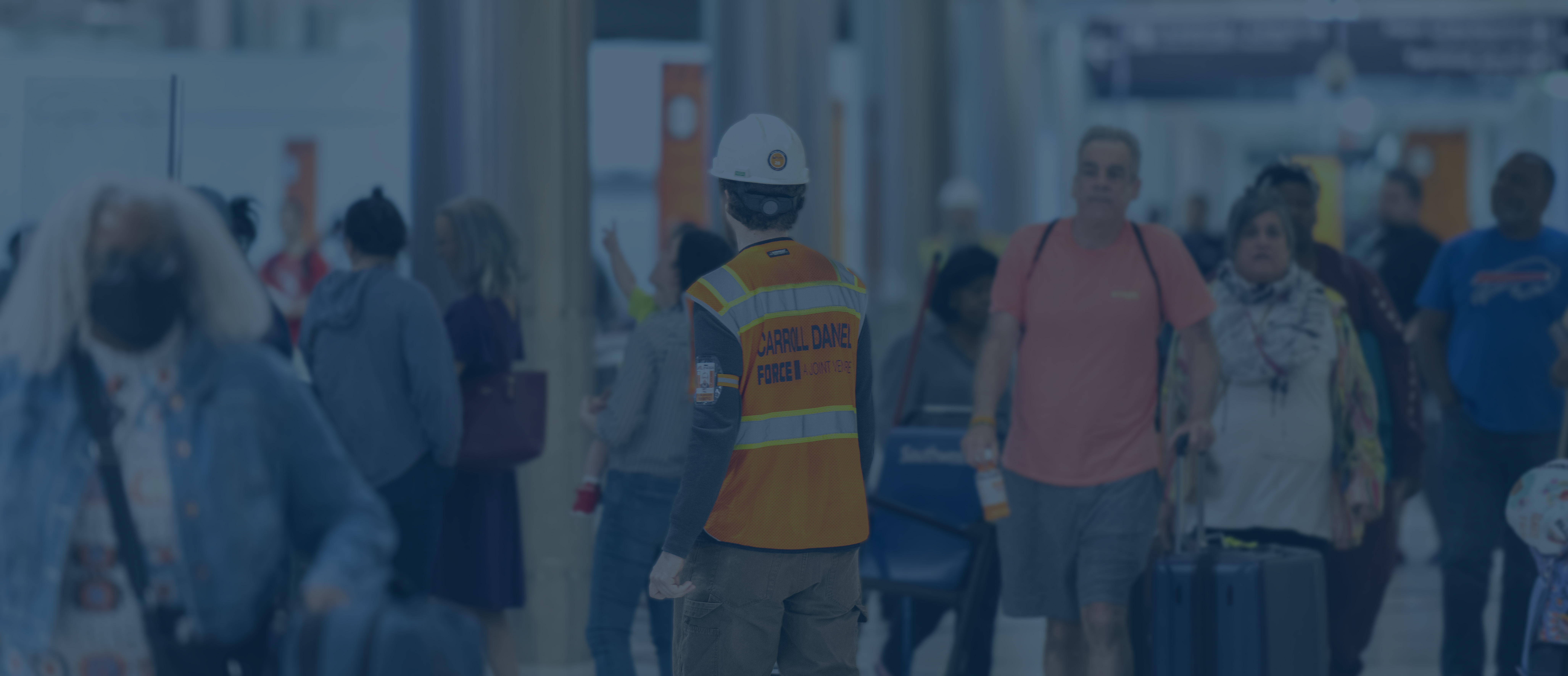 image of a carroll daniel engineer at hartsfield jackson atlanta international airport with safety vest on