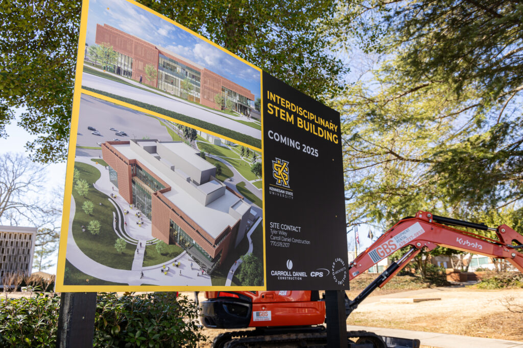sign with rendering of new KSU STEM building from groundbreaking ceremony
